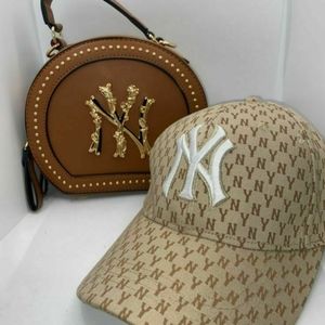 New New York Tan hand and Brown NY purse
